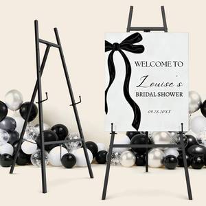 lot 19564 image: Black Easel Stand for Signs, 4-Tier Height Metal Standing Easel with Adjustable Chain, Heavy Duty Art Easel for Painting, Wedding Sign, Party, Posters & Commercial Display - Retail $49