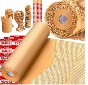 lot 19579 image: Professional Packaging Supply Kit with Kraft Paper and Fragile Tape - Retail $25