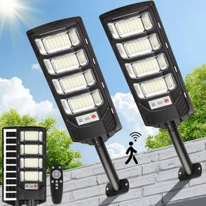 lot 19610 image: Solar Flood Lights Outdoor LED 2 Pack Solar Street Lights Outdoor Waterproof Dusk to Dawn 12000 Lumen Solar Powered Wall Mount Lamp Motion Sensor Security Remote Control for Yard Parking Driveway - Retail $45