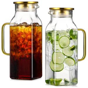 lot 19620 image: 2 Pack 2 Liters68 oz Square Glass Pitcher with Lid and Handle for Fridge, Iced Tea and Coffee Carafe Beverage Serveware, Heat Resistant Borosilicate Water Gold Jug for HotCold Drinks and Milk - Retail $30