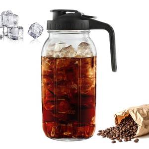 lot 19621 image: Mason Jar Pitcher, Mumulo 2 Quart Glass Iced Tea Pitcher with Handle and Lid, Glass Pitchers for Iced Tea, Sun Tea, Cold Brew Coffee, Fresh Juice and Milk (64oz) - Retail $13