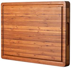 lot 24164 image: Allsum Bamboo Wood Cutting Board for Kitchen, 1 Thick Butcher Block, Cheese Charcuterie Board, with Side Handles and Juice Grooves, 16x11 - Retail $22