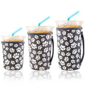 lot 28130 image: KJQJLY 3 Pack Reusable Iced Coffee Sleeves for Iced Coffee Cups or Drinks Reusable Neoprene Insulated Sleeves for Hot and Cold Drinks from Starbucks, Dunkin, And More (Paw Prints) - Retail $10
