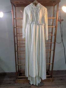 lot 17 image: Ivory Long Sleeve Beaded Wedding Gown with Pearl Embellishments