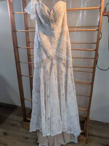 lot 23 image: Strapless Lace Wedding Gown with Ruffle Detail