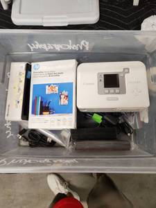 lot 1053 image: Canon Selphy Compact Photo Printer Bundle with Accessories