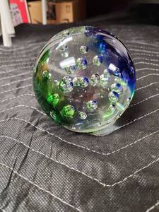 lot 1060 image: Art Glass Paperweight with Controlled Bubbles Blue and Green