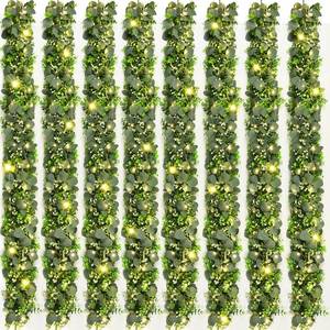 lot 5737 image: 8Pcs Eucalyptus Garland with Lights, Greenery Garland, Green Garland with Flowers, 5.9FT Artificial Faux Eucalyptus Leaves Vines for Table Mantle Home Wedding Party Indoor Outdoor Decor��2 Long Lights��