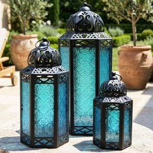 lot 5962 image: VELA LANTERNS Set of 3 Blue Glass & Black Metal Moroccan Candle Lantern Holders (XL, Large, Small) - Decorative IndoorOutdoor Decor for Patio, Floor, Weddings & Ramadan