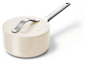 lot 37772 image: Caraway Nonstick Ceramic Sauce Pan with Lid (1.75 qt) - Non Toxic, PTFE & PFOA Free - Oven Safe & Compatible with All Stovetops (Gas, Electric & Induction) - Cream - Retail $125