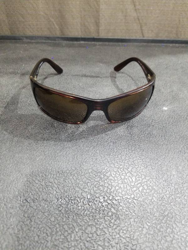 lot 3511 image: Maui Jim Designer Sunglasses with Carrying Case and Accessories