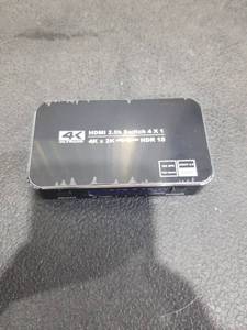 lot 1331 image: 4K HDMI 2.0b 4-Port Switch with Remote Control
