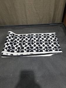 lot 1382 image: Coach Signature Monogram Knit Scarf Black and White