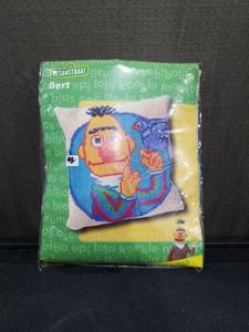 lot 1394 image: Sesamstraat Bert Cross Stitch Pillow Kit by Thea Gouverneur