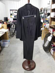 lot 1421 image: Calvin Klein Slim Fit Black Two-Piece Suit Jacket 42R and Pants 32 x 32