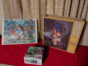 lot 47 image: Assorted Jigsaw Puzzle Collection with Fantasy and Educational Themes