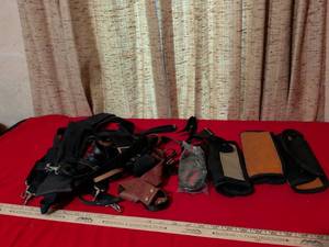 lot 55 image: Camera bag straps and shoulder pad straps