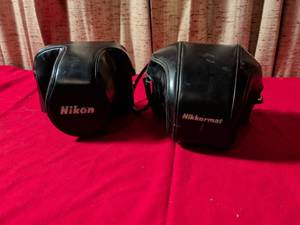 lot 59 image: Nikon and Nikkormat Black Leather Camera Cases - Set of Two