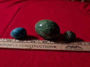 lot 70 image: Polished Stone Eggs and Swirl Glass Marble Egg
