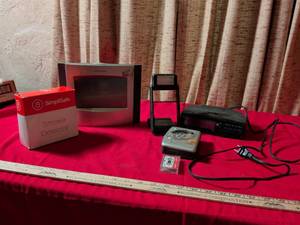 lot 78 image: Mixed Electronics Lot SimpliSafe Smoke Detector, AcuRite Weather Station, GE Alarm Clock Radio, Sony Walkman WM-FX244 & More