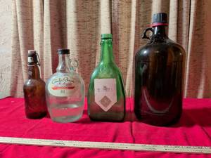 lot 98 image: Set of 4 Decorative Glass Bottles