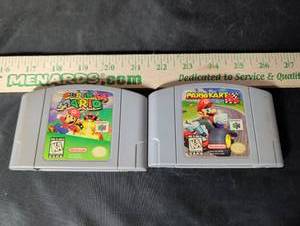 lot 150 image: Super Mario 64 & Mario Kart 64 Nintendo 64 Cartridge Bundle