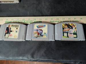 lot 153 image: Ken Griffey Jr. Major League Baseball & Madden Football 64 - Nintendo 64 Cartridge Lot