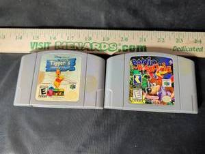 lot 160 image: Nintendo 64 tiggers honey hunt & Nintendo 64, banjo and koozie