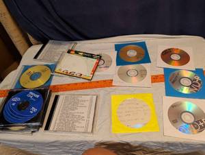 lot 212 image: Mixed CD DVD Lot with Disney Sword in the Stone DVD