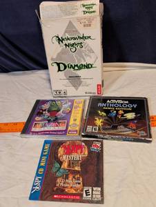 lot 216 image: PC CD-ROM Game Lot - Neverwinter Nights Diamond, Activision Anthology Remix, I Spy Mystery, Amazing Animals