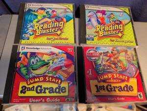 lot 255 image: Knowledge Adventure Reading Blaster & JumpStart Educational CD-ROM Bundle (4 Pack)