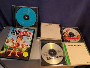 lot 261 image: Mixed Lot of DVDs and CDs - The Ant Bully, Cat in the Hat, Meet Me in St. Louis & More