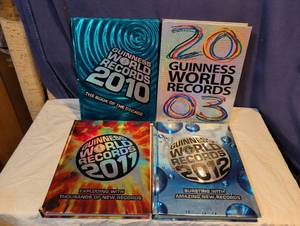 lot 268 image: Guinness World Records Hard Cover Book Collection 2003, 2010, 2011 & 2012