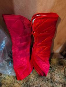 lot 322 image: Red Quilted Horse Leg Wraps Set