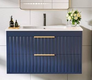 lot 26 image: Navy Blue Floating Vanity With Fluted Drawers