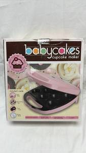 lot 82 image: Babycakes Mini Cupcake Maker CC-2828PK Pink