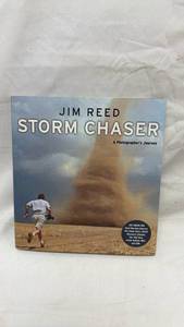 lot 113 image: Jim Reed Storm Chaser A Photographers Journey Signed Book