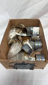 lot 123 image: Flat full of different napkin rings