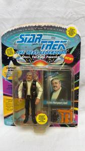 lot 133 image: Star Trek TNG Captain Montgomery Scott Action Figure by Playmates