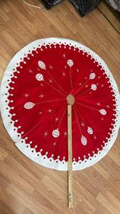 lot 194 image: Red Felt Christmas Tree Skirt with Embroidered Ornaments