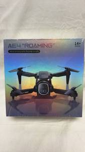lot 200 image: AE4 Roaming Aerial Photography Foldable Drone with Camera and Remote Control