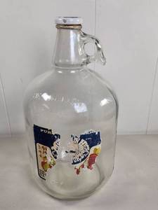 lot 94 image: One Gallon Glass Jug with Handle and Original Label