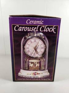 lot 112 image: Ceramic Carousel Dome Clock