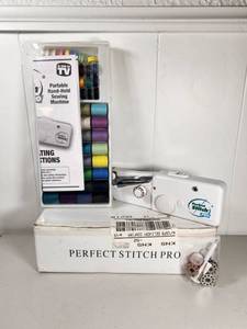 lot 156 image: Perfect Stitch Pro Portable Hand-Held Sewing Machine with Thread Set