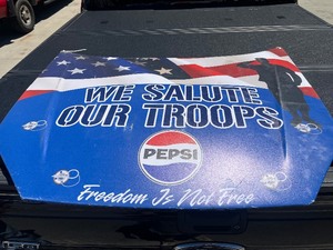 lot 20 image: Car Hood Display --WE SALUTE OUR TROOPS FREEDOM IS NOT FREE --18 PLASTIC HOOD--27 X 23