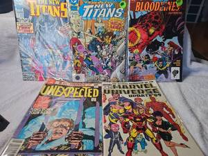 lot 1056 image: DC & Marvel Comic Book Lot - New Titans Annuals, Bloodlines, Unexpected & Marvel Universe Update