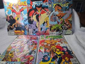 lot 1062 image: DC Team Titans Comic Book Lot - Issues #22, #23, #24, Annual #1 & Special