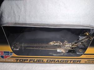 lot 2005 image: CarQuest Auto Parts Paul Romine Top Fuel Dragster Golden Edition 125 Scale Die-Cast Model
