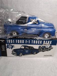 lot 2605 image: Ertl Collectibles 1951 Ford F-1 Truck Bank Wix Filters Die-Cast