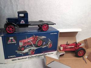 lot 3102 image: ERTL Big A Auto Parts 1931 Hawkeye Flatbed & Farmall 350 Tractor Die-Cast Set